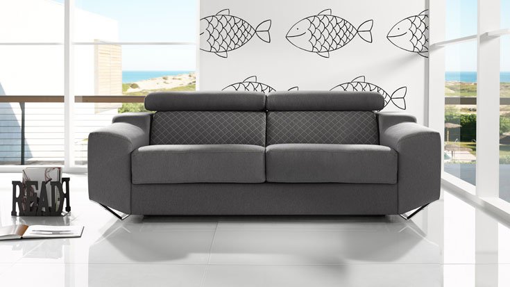 sofá de líneas rectas y modernas, así como sus patas metálicas y ese color ideal para este tipo de combinaciones hacen de este modelo sin duda una buena elección a la hora de decorar un salón con estilo industrial.